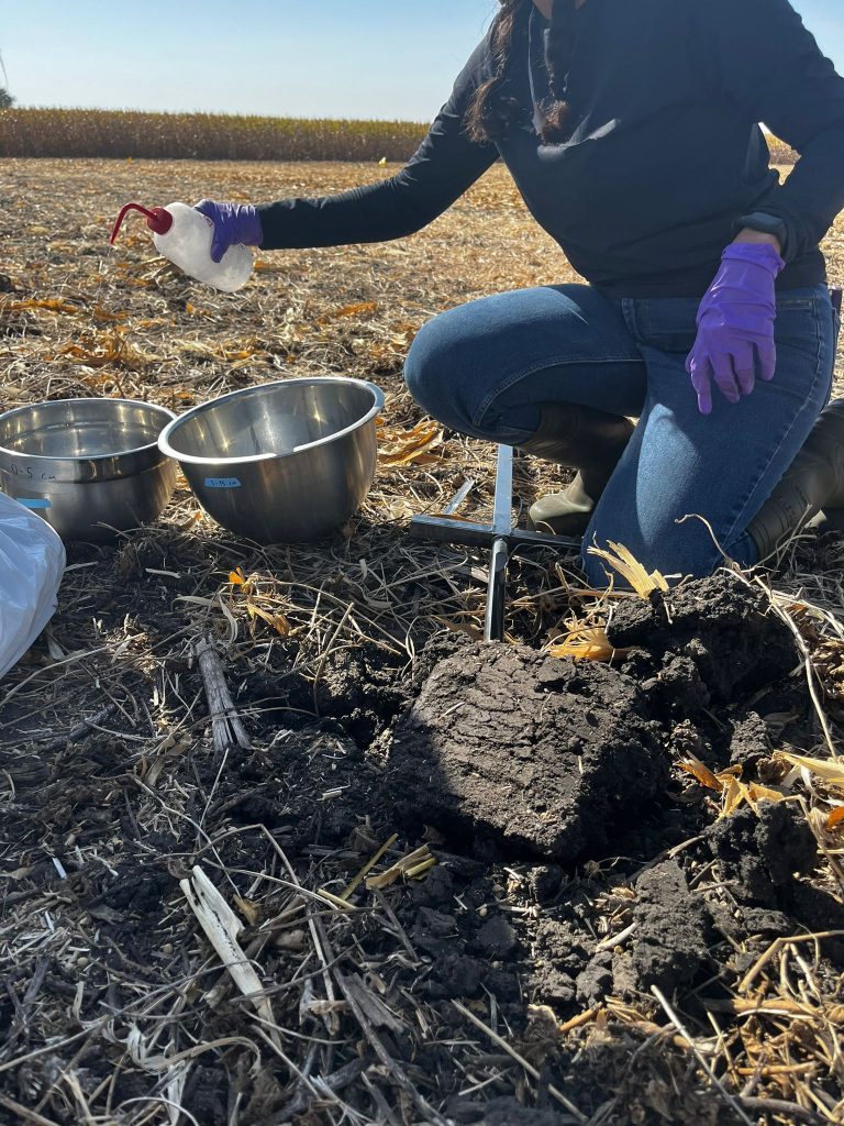 Researcher analyzing water quality sample in portable laboratory